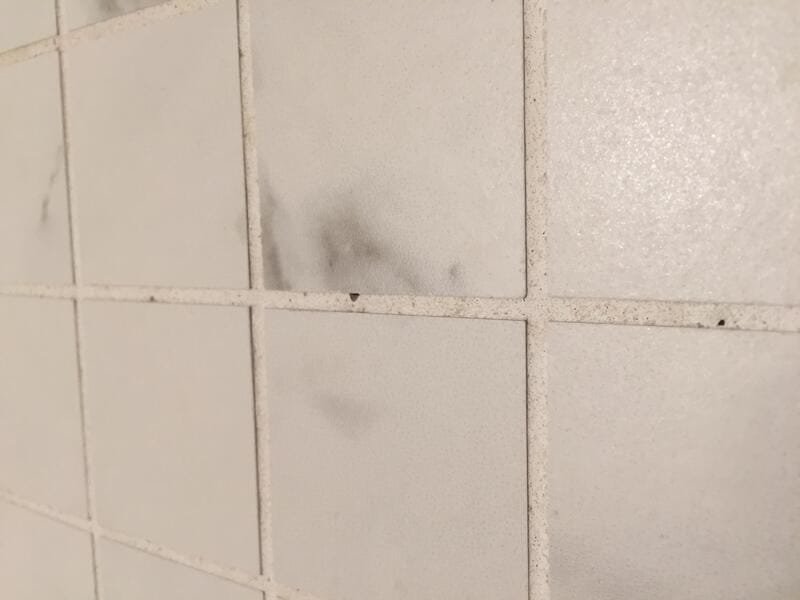 How To Fix Pinholes in Shower Grout We Caulk Showers